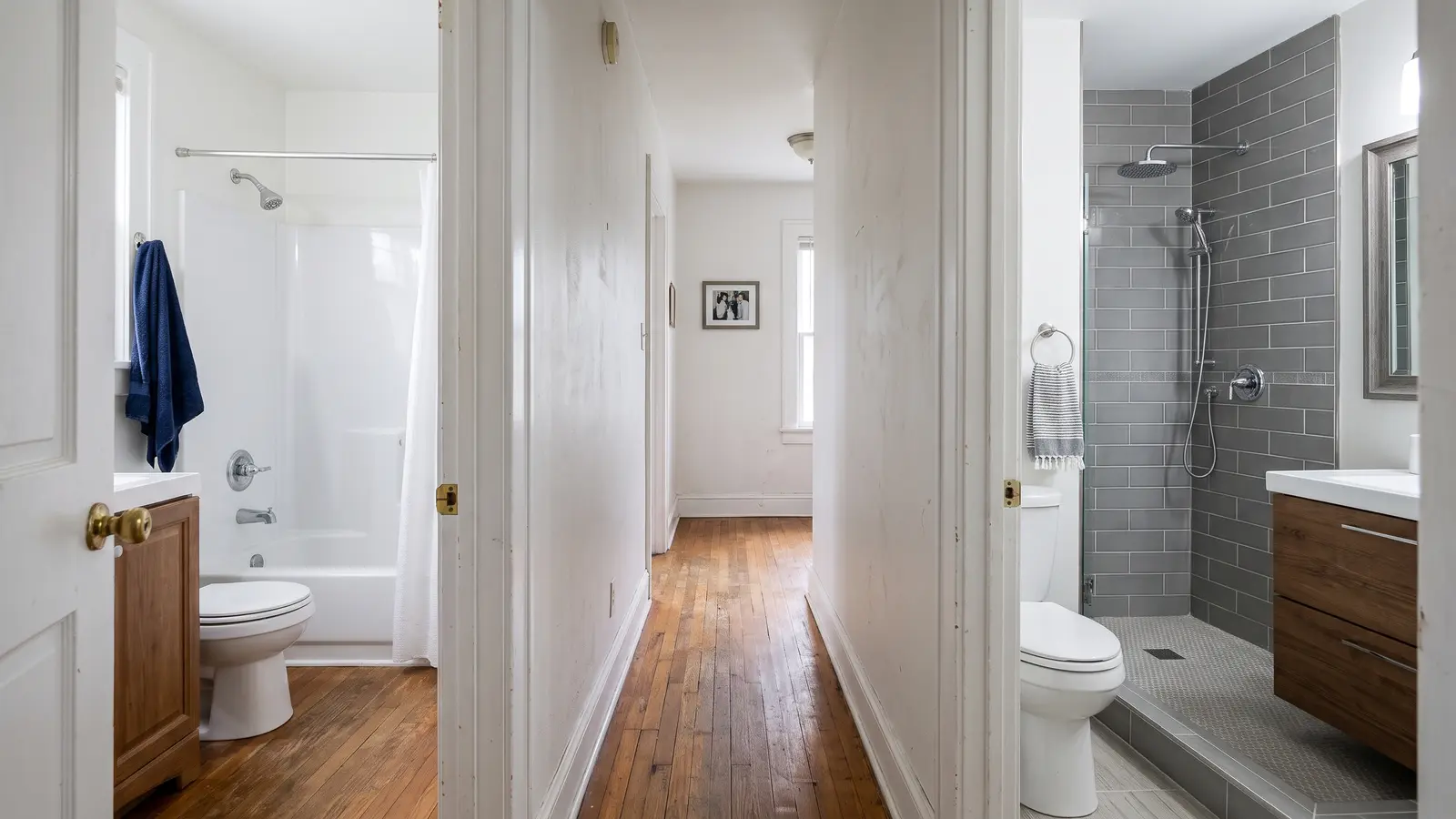 Two Lexington shower alcoves side by side, one with white stone-look acrylic panels and one with gray porcelain tile